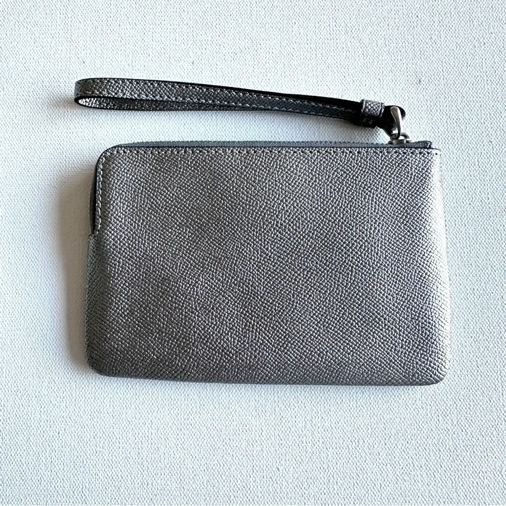 COACH Metallic Silver Corner Zip Wristlet